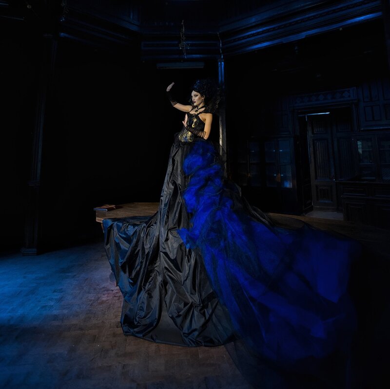 Person in Blue Gown — Dramatic