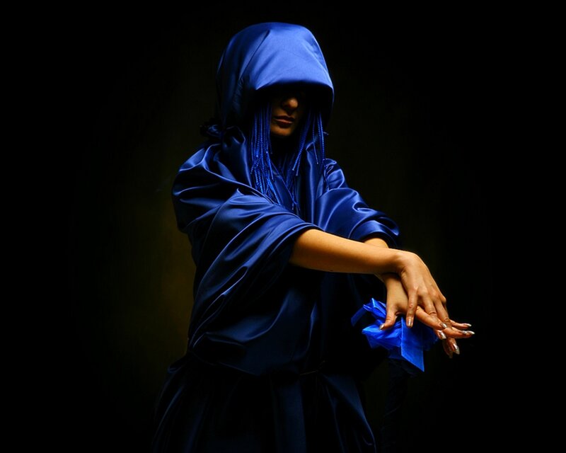 Person in Blue Hooded Robe