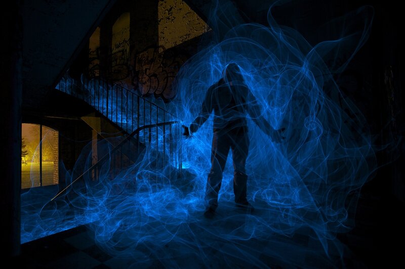 Person in Blue Light