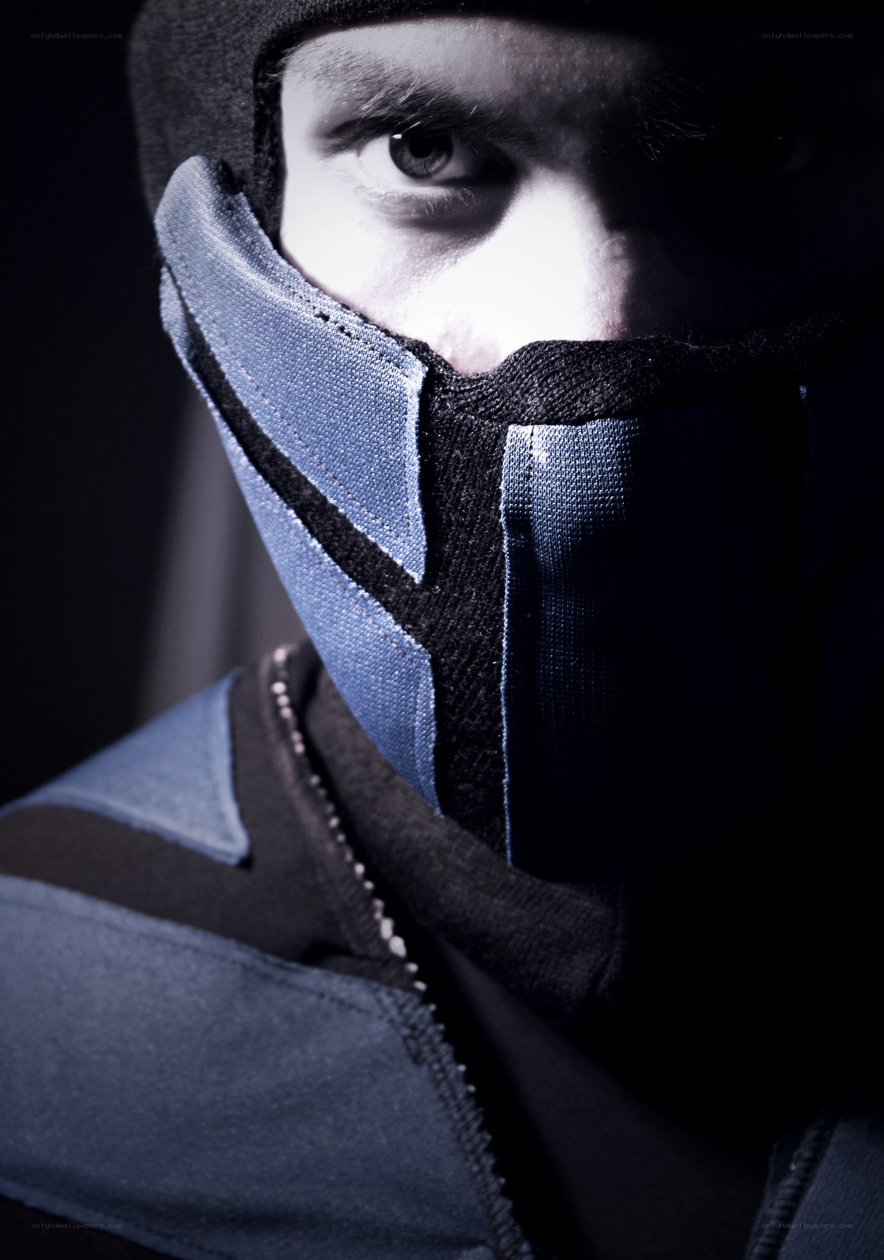 person in blue mask