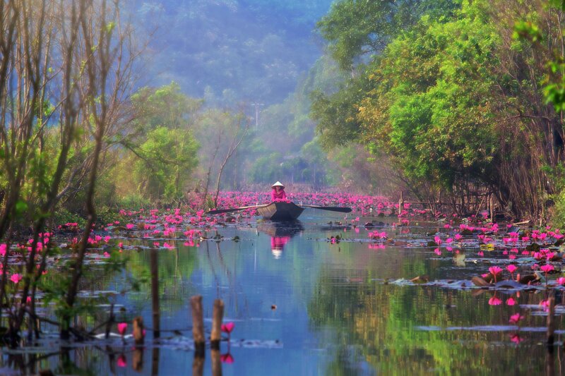 Person in Boat on River
