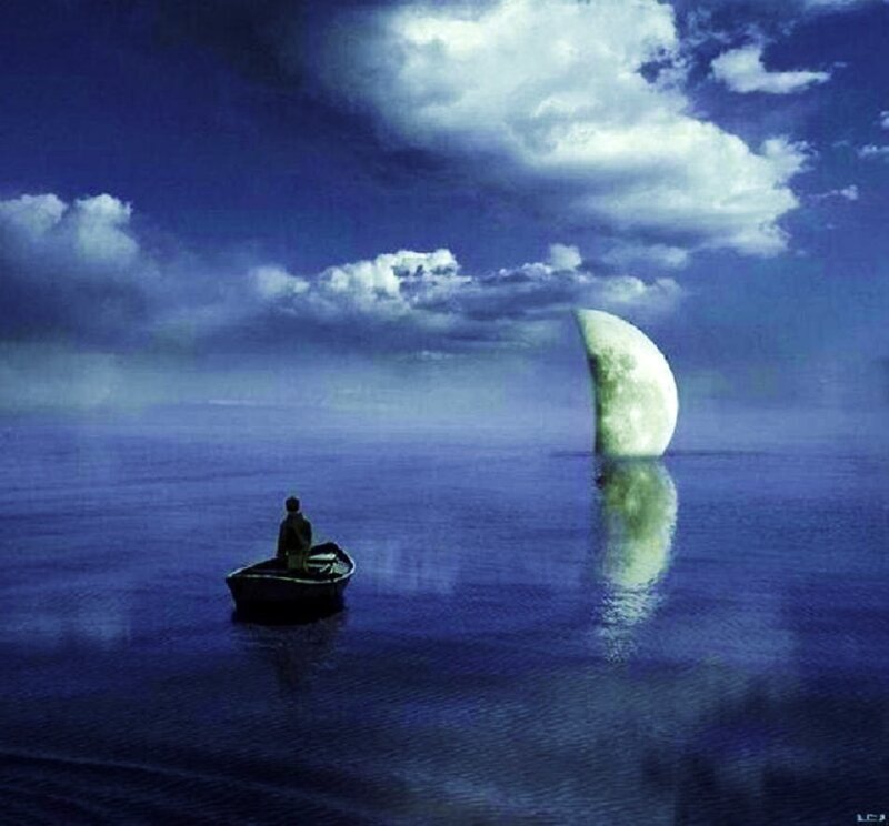 Person in boat under moon