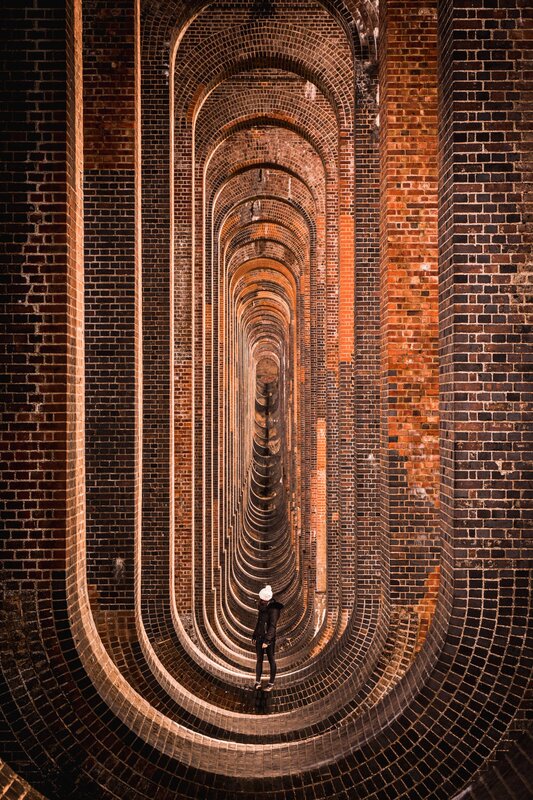 Person in Brick Tunnel