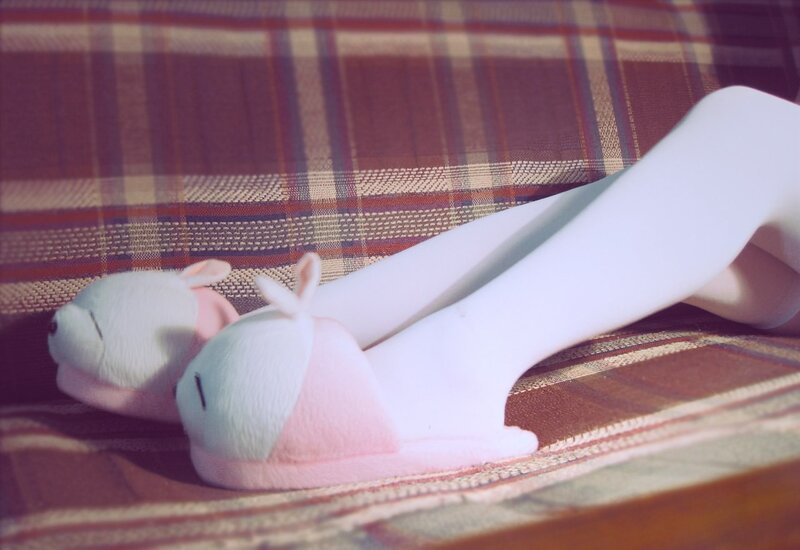 person in bunny slippers