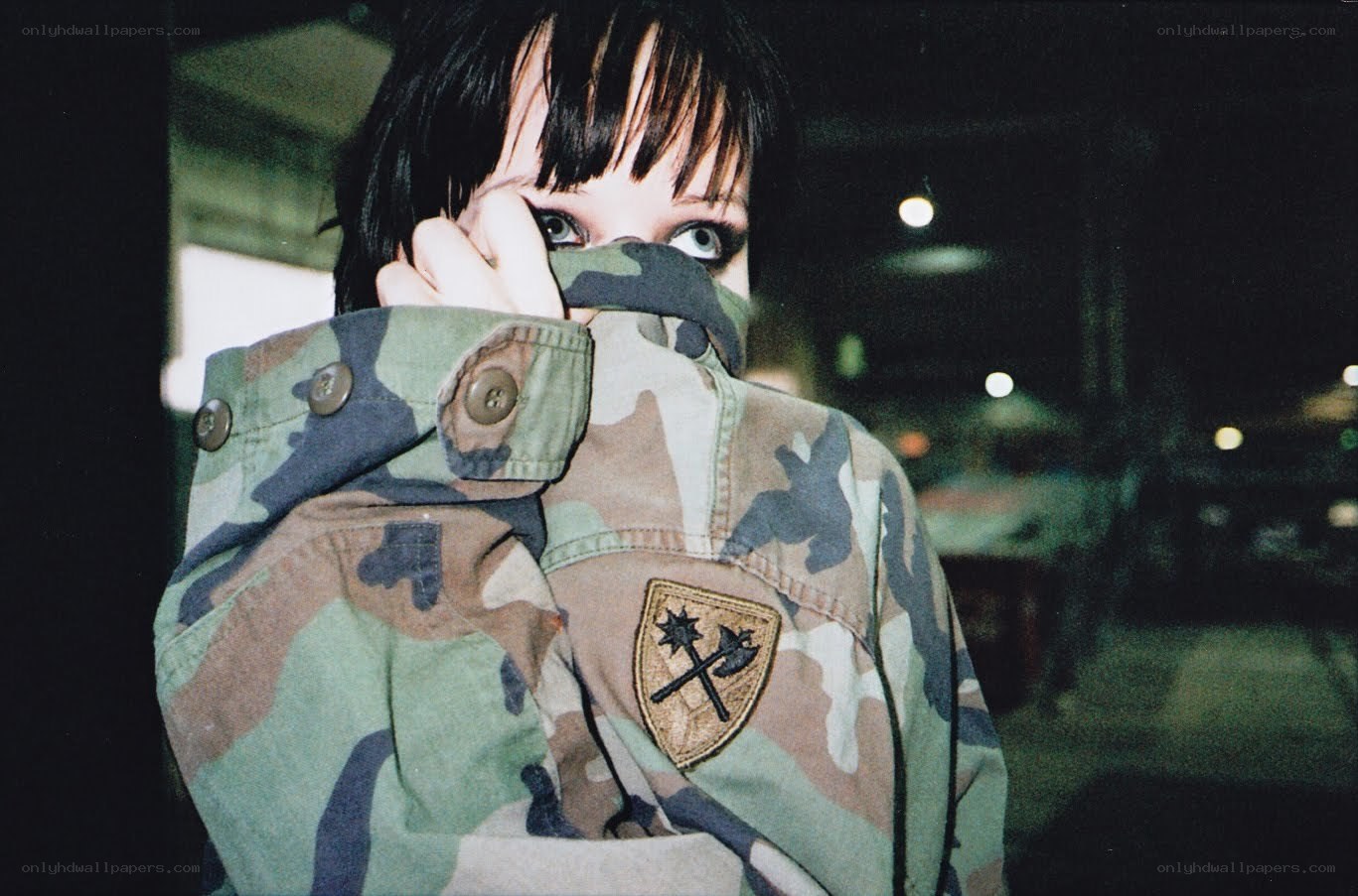 person in camouflage jacket
