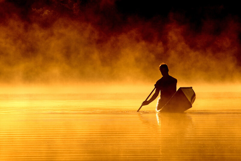 Person in Canoe — Gold