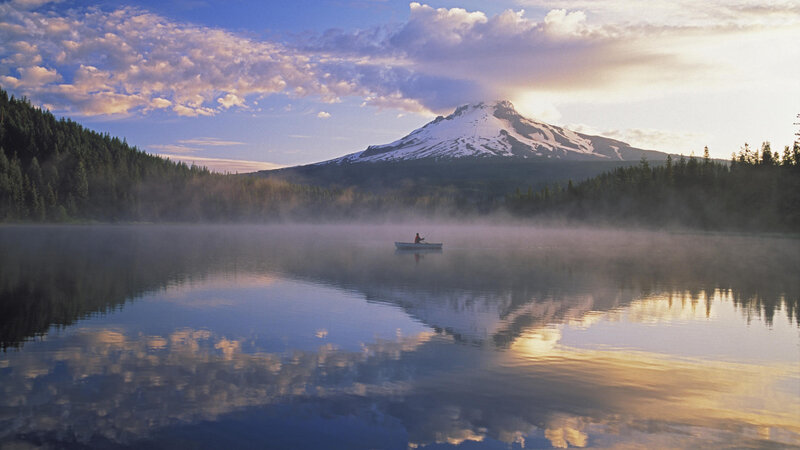 Person in Canoe on Lake — Blue