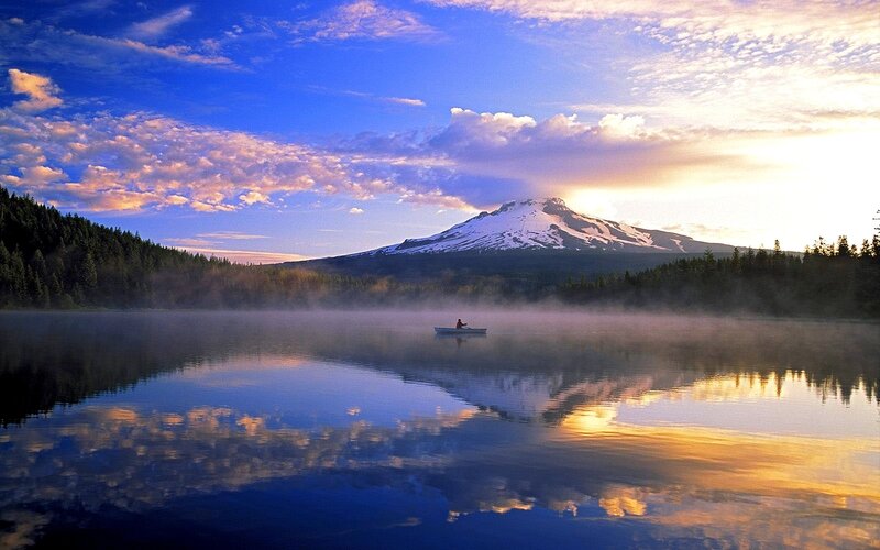 Person in Canoe on Lake