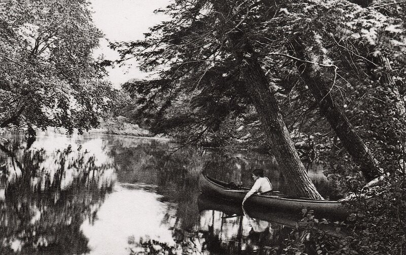 Person in canoe on river