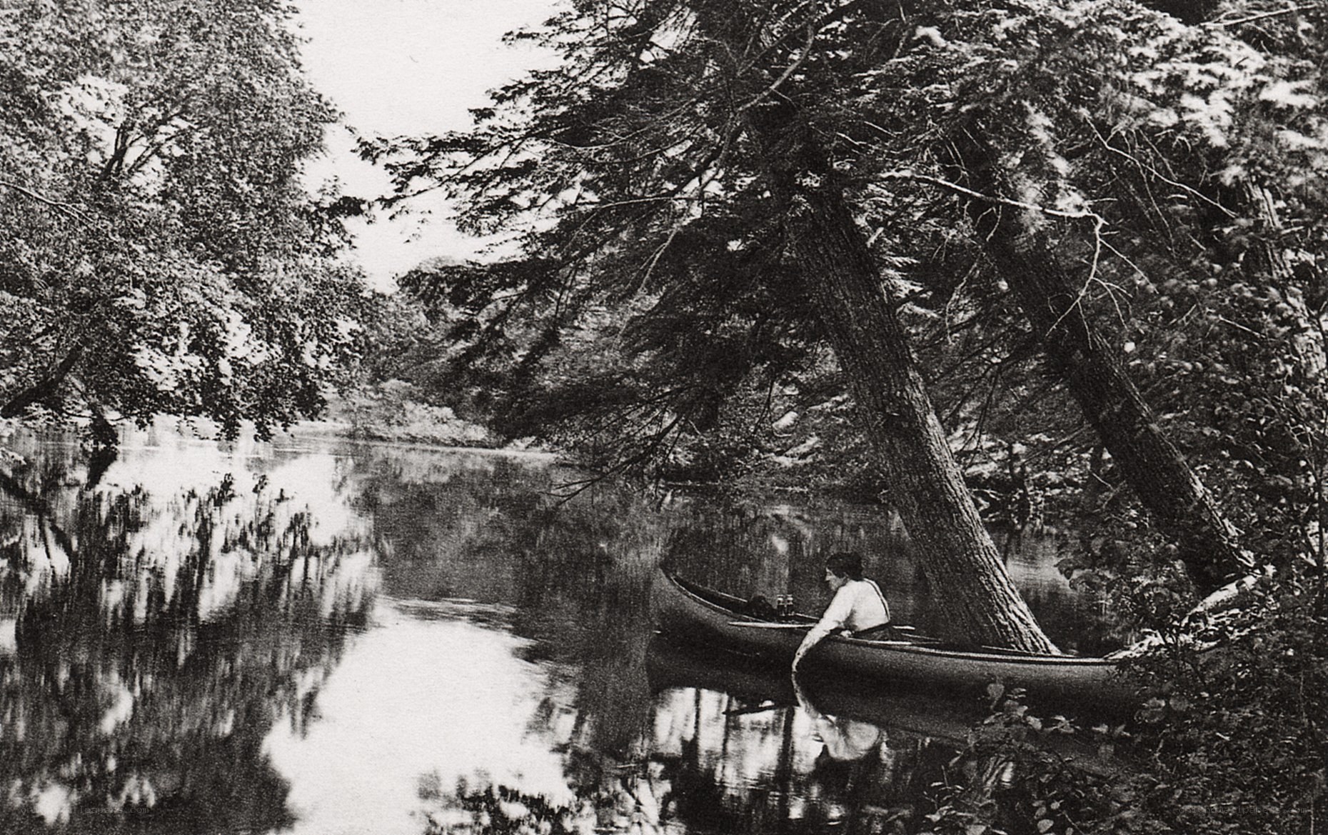 Person in canoe on river