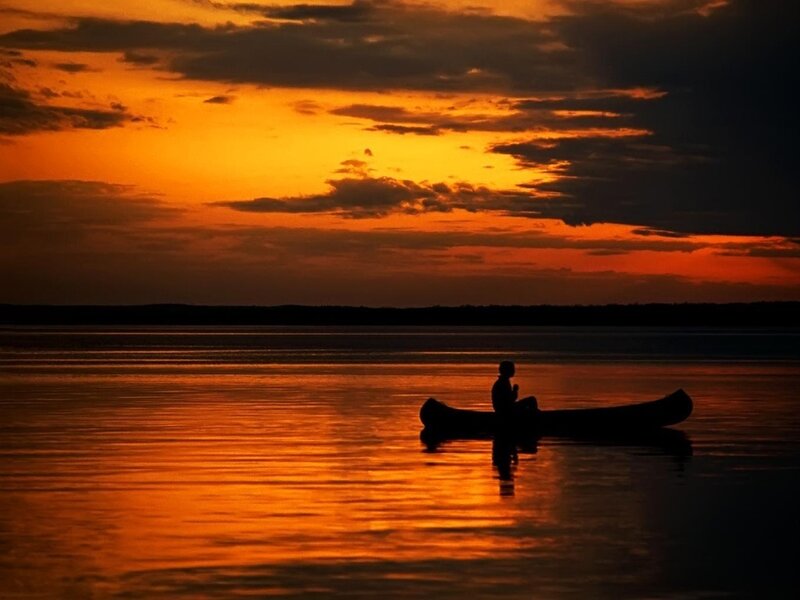 Person in Canoe — Orange, Serene