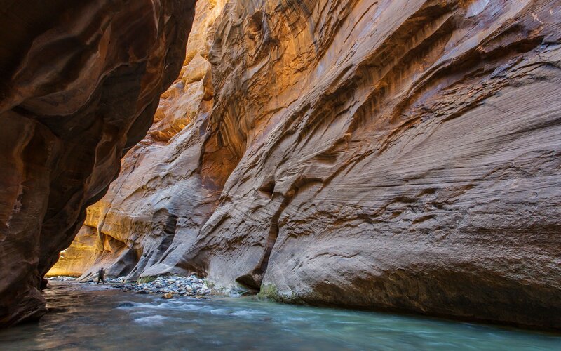 Person in Canyon Stream