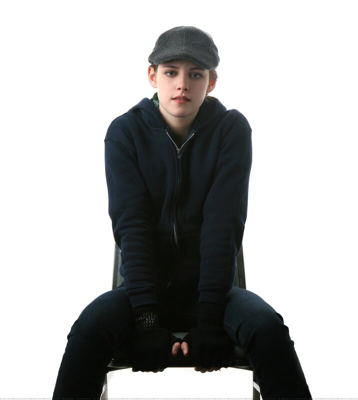 person in cap and hoodie