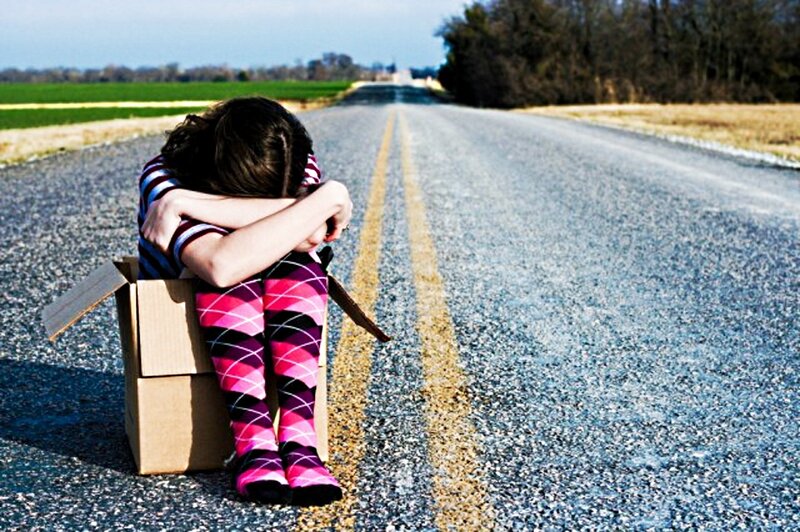 Person in Cardboard Box