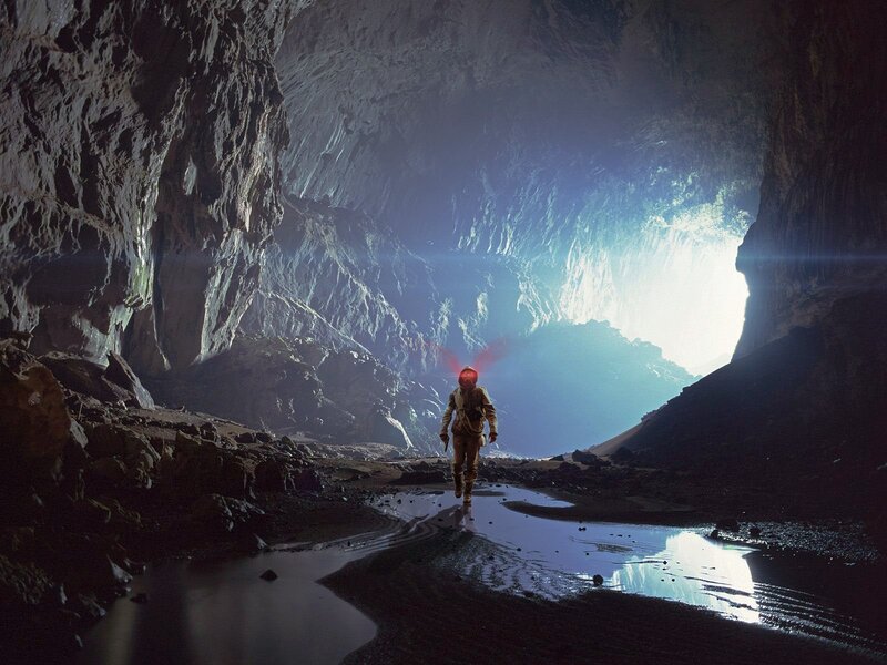 Person in Cave — Blue