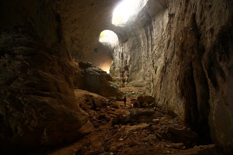 Person in Cave — Brown, Dramatic, Photograph, Rock