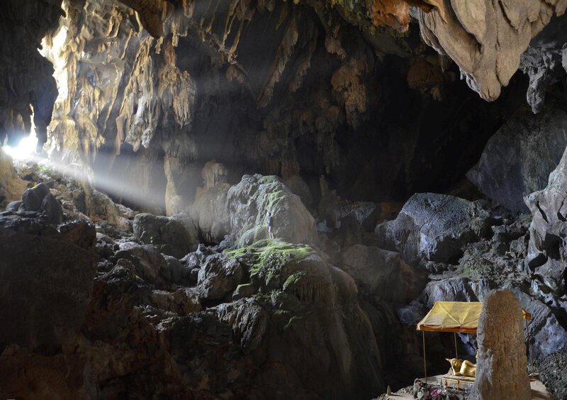 Person in Cave — Brown