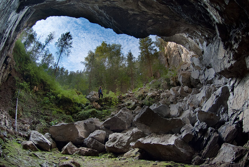 Person in Cave Entrance