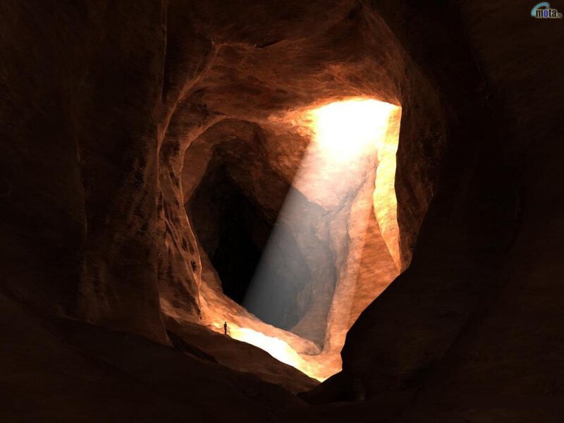 Person in Cave Tunnel