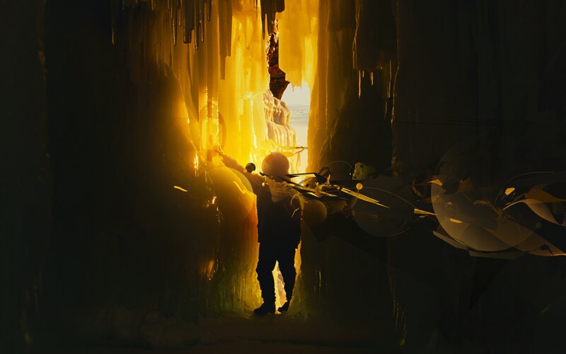 Person in Cave with Gear