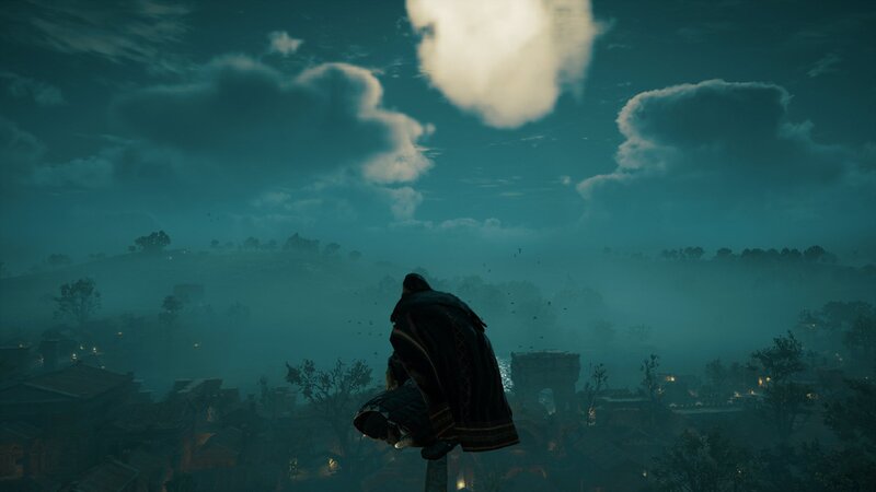 Person in Cloak on Rooftop