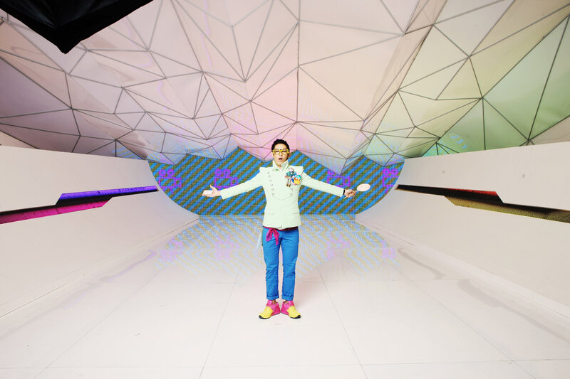 person in colorful outfit on stage