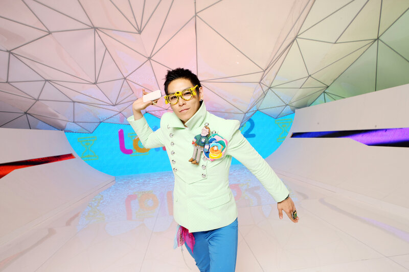 person in colorful outfit on stage