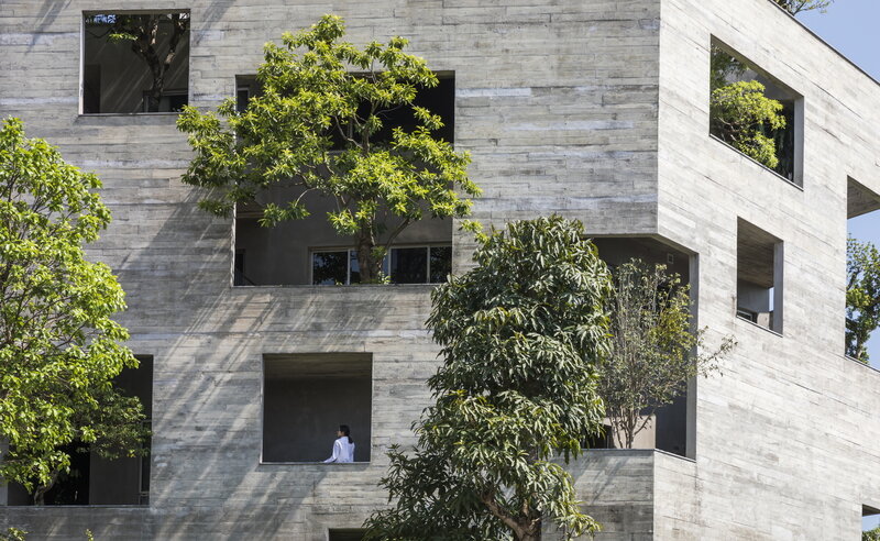 Person in Concrete Building