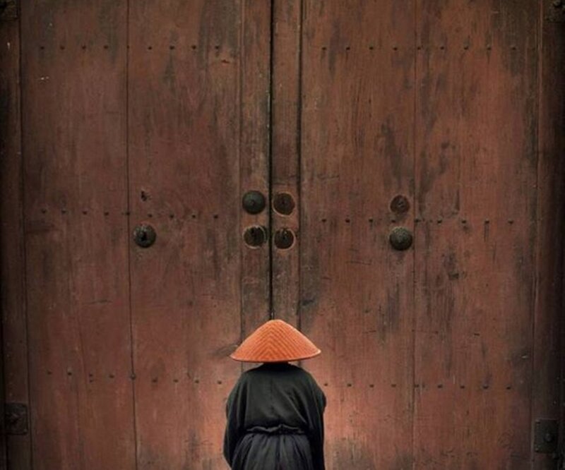 Person in Conical Hat — Brown, Serene