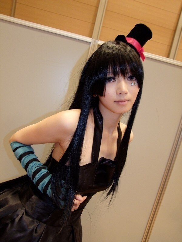 Person in Cosplay Costume — Black, Neutral, Photograph