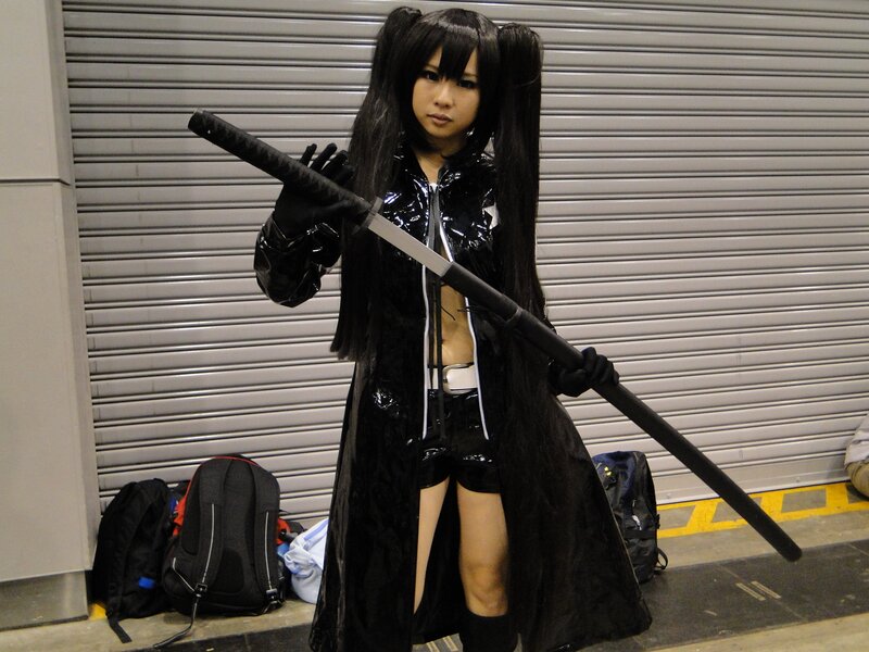 Person in Cosplay Costume — Black, Serious, Photograph