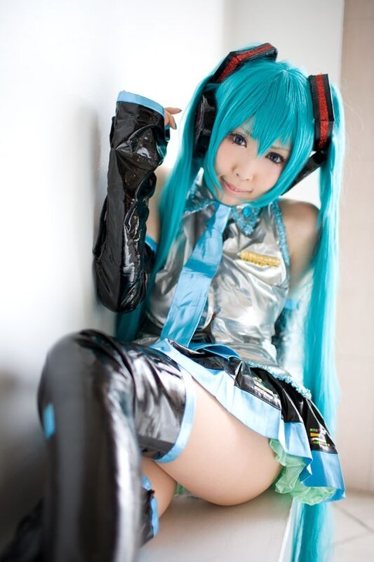 Person in Cosplay Costume — Cyan, Neutral, Photograph