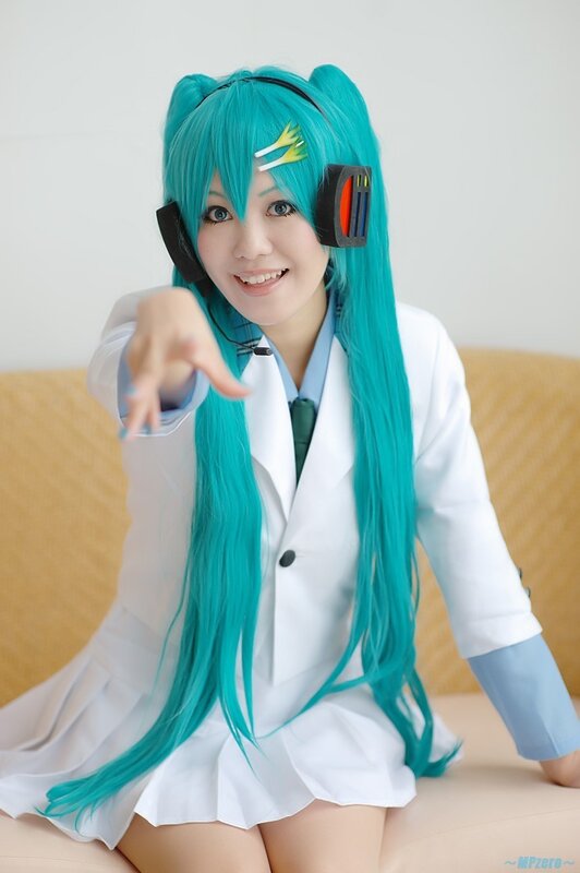 Person in Cosplay — Cyan, Playful, Photograph, Headset