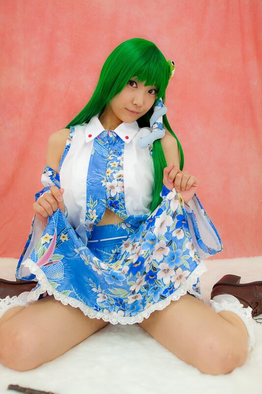Person in Cosplay — Green, Playful, Photograph, Green Wig, Doll