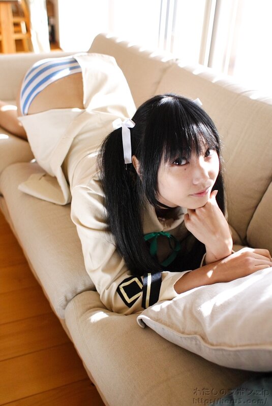 Person in Cosplay on Couch — Beige