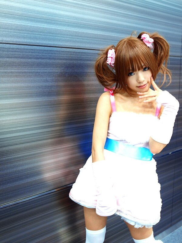 Person in Cosplay Outfit — White, Playful, Photograph