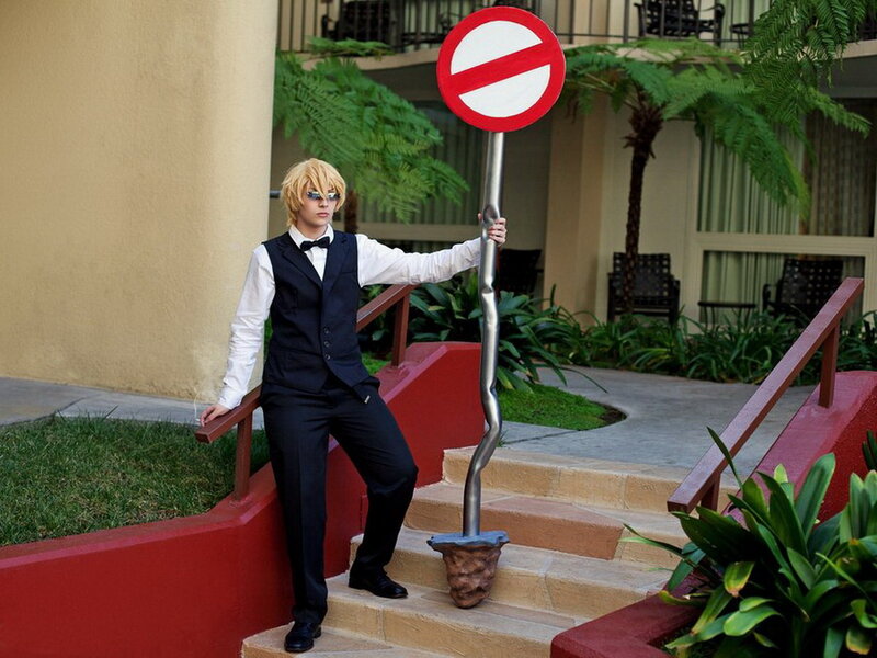 Person in Costume Holding Sign