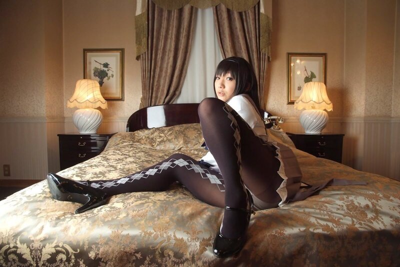Person in Costume on Bed — Brown