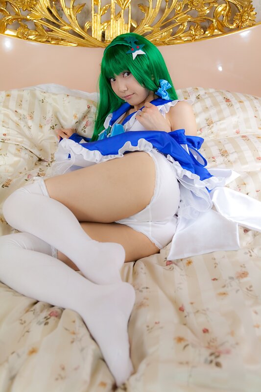 Person in Costume on Bed — White, Playful
