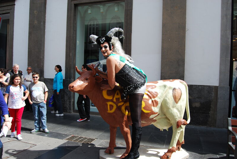 Person in Costume on Cow