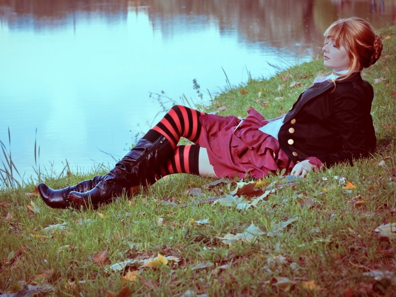 Person in Costume on Grass — Green