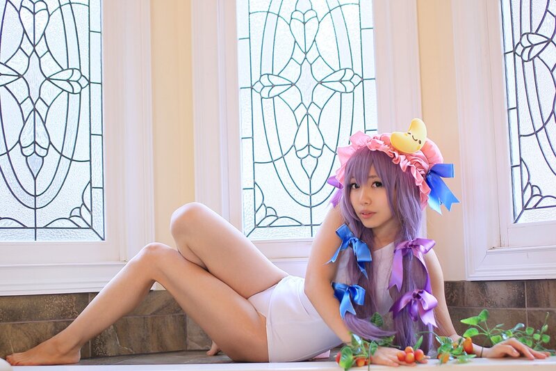 Person in Costume Sitting — Purple