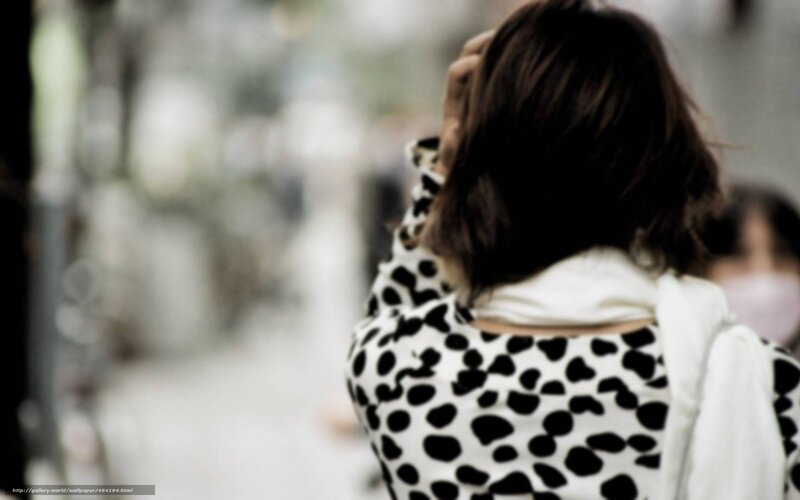 person in cow print shirt