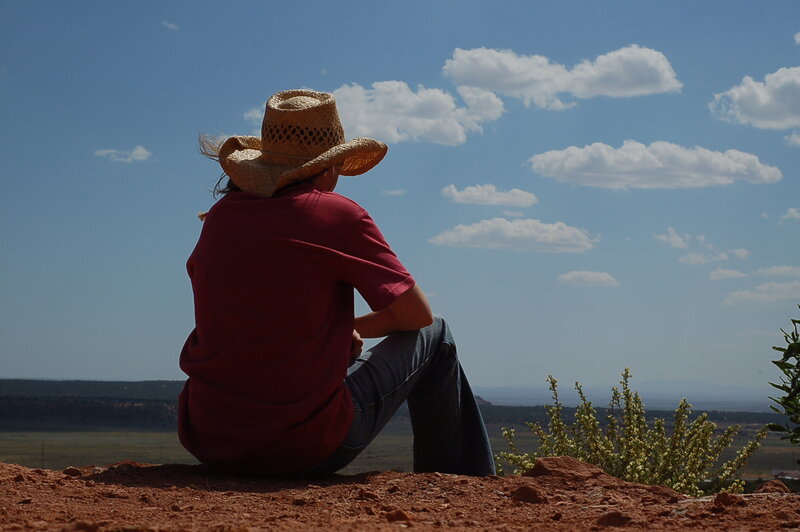Person in Cowboy Hat — Red, Serene