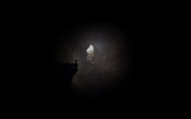 Person in Dark Cave — Black, Dramatic