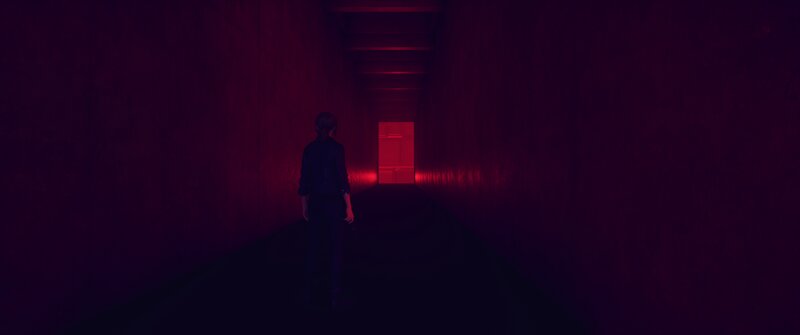 Person in Dark Corridor — Red