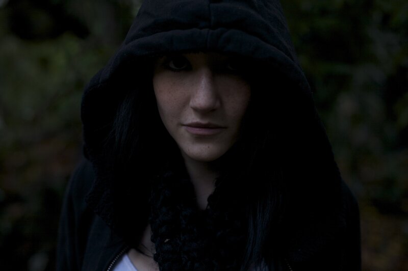 person in dark hoodie