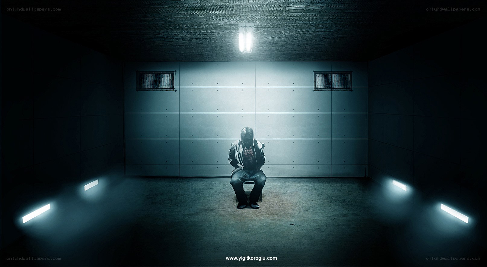 person in dark room