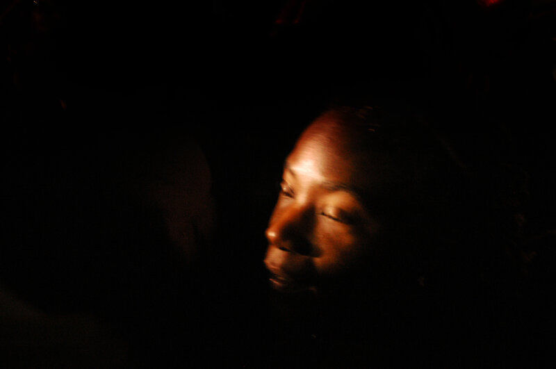Person in Dark Room — Black