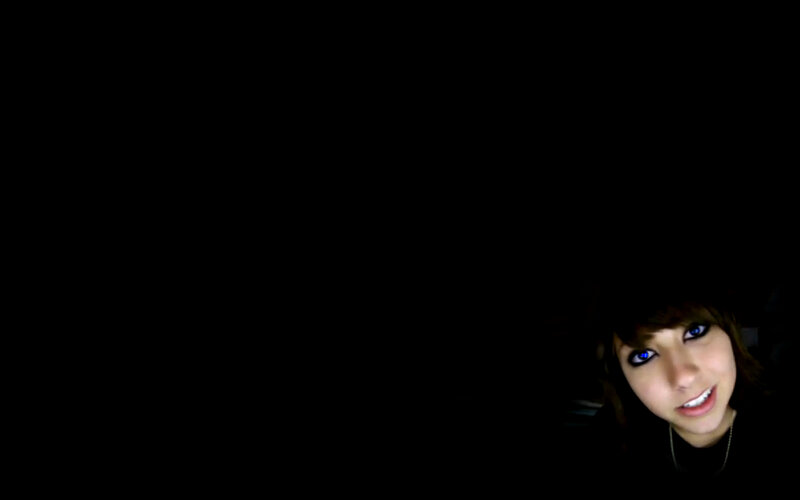 person in dark room